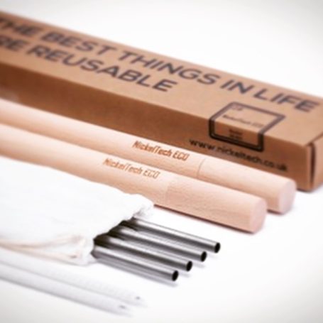 Set of reusable titanium straws with a cardboard box and metal components.